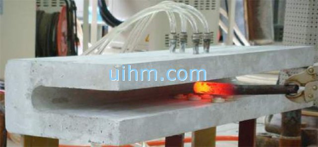 U shape induction coil for heating steel ends